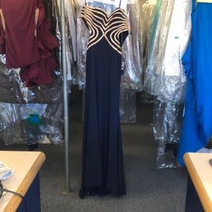 Faviana gown navy blue with gold beading .